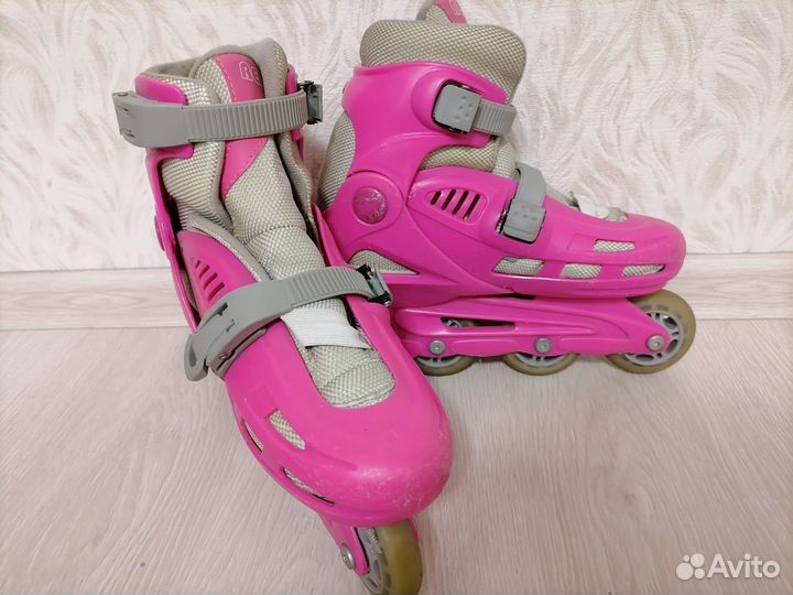 Роликовые коньки