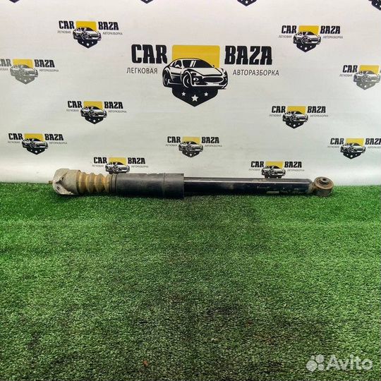 Амортизатор задний левый