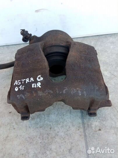 Суппорт тормозной передний правый Opel Astra G