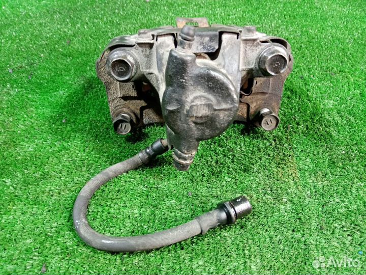 Суппорт тормозной задний левый Toyota Land Cruiser