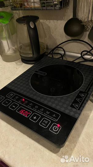 Индукционная плита midea