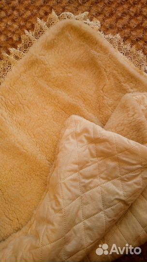 Теплый конверт на выписку малыша на овчине