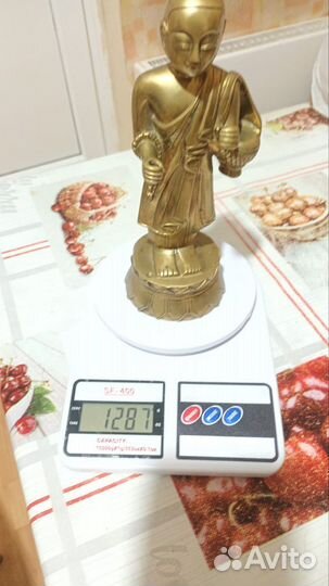 Статуэтка будда