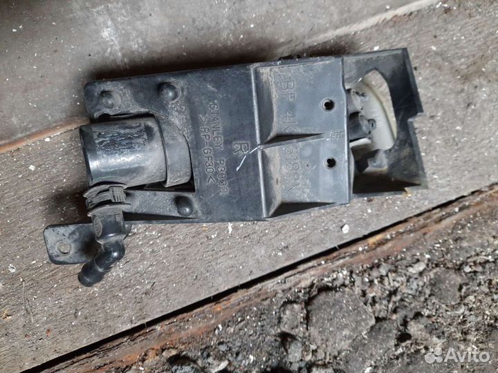 Омыватель фары от мазды 3 2007 года