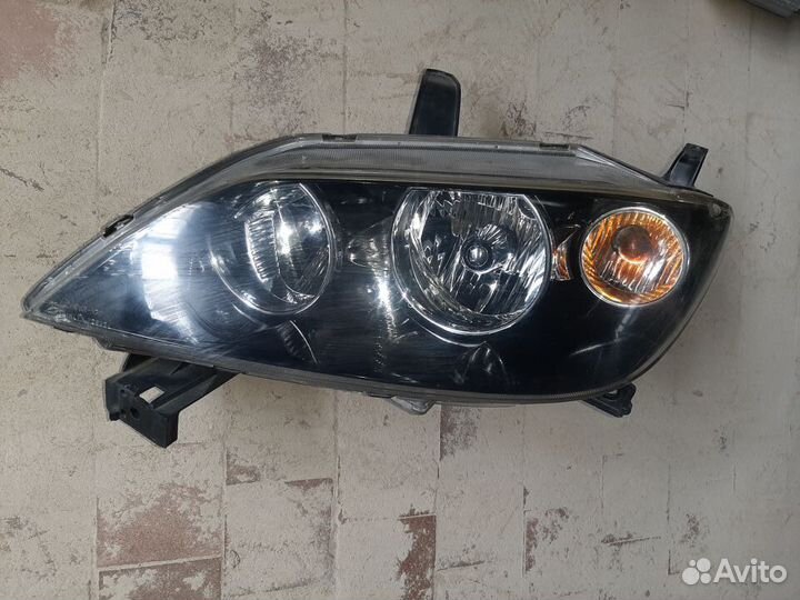 Фара левая мазда демио