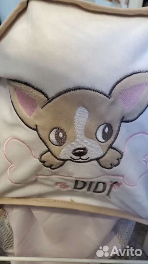 Игрушечная коляска с собачкой