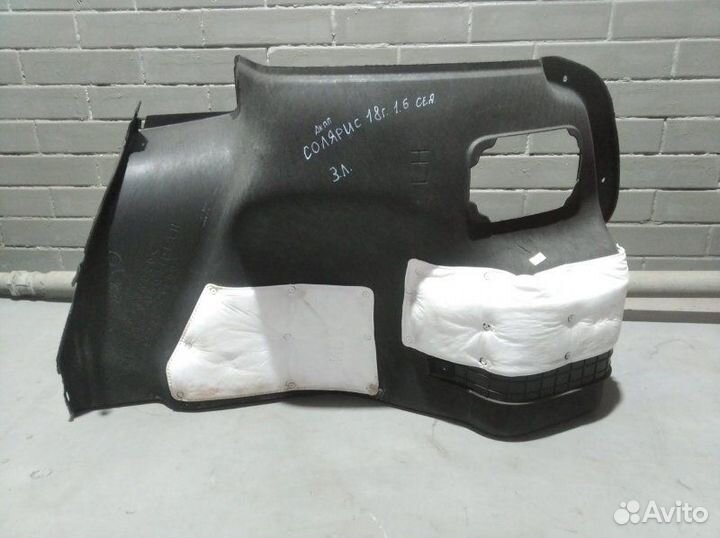 Обшивка багажника задняя левая Hyundai Solaris