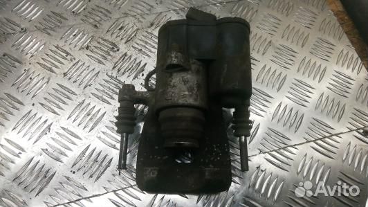 Суппорт тормозной задний правый volkswagen passat