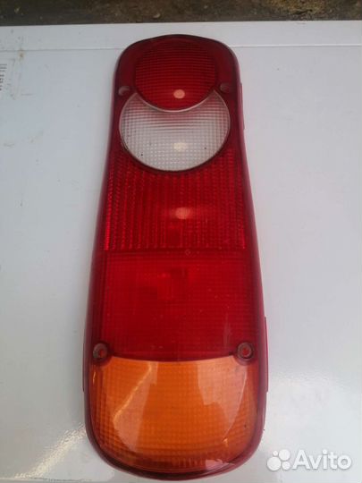 Стекло заднего фонаря для Nissan Cabstar