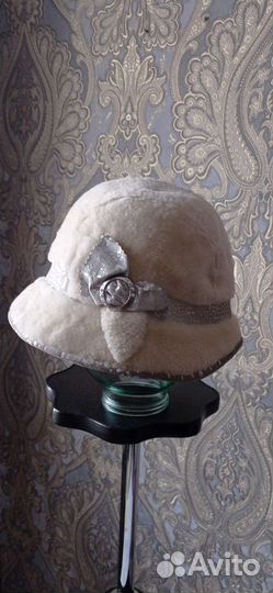 Женские меховые шапки