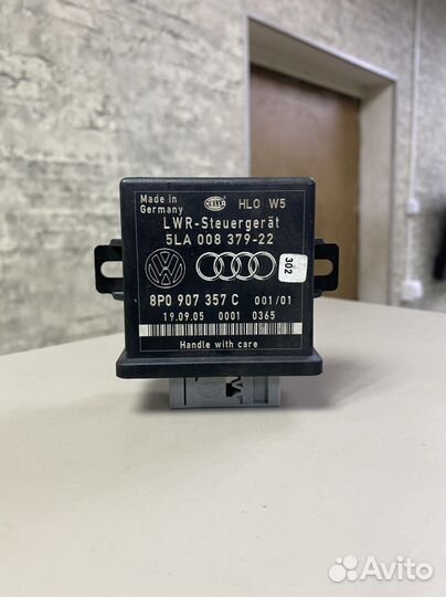 Эбу системы освещения и коррекции фар Ауди А6 С6