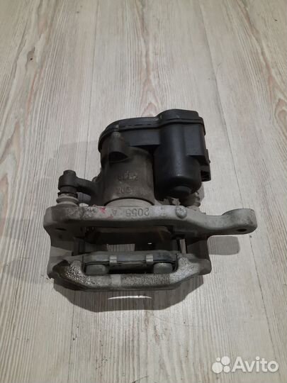 Суппорт тормозной задний Nissan X-trail T32 Лев