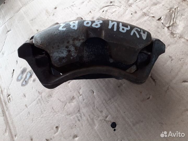 Суппорт передний левый Ауди 80,90