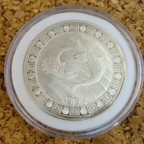 Монета 2012 знак зодиака Рыбы серебро ммд Токелау