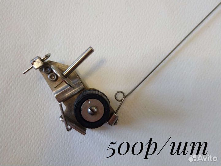 Блок /трезубец нитенатяжителя/нитенаправитель