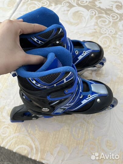 Роликовые коньки