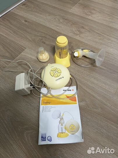 Молокоотсос medela электрический