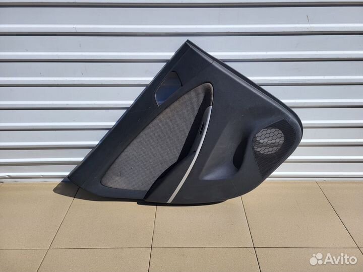 Обшивка двери задняя левая Hyundai Solaris