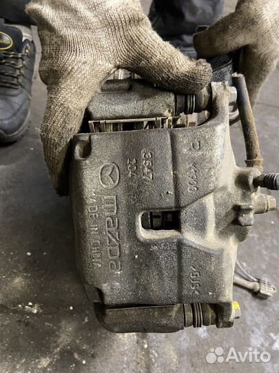 Поворотный кулак mazda 3 бм