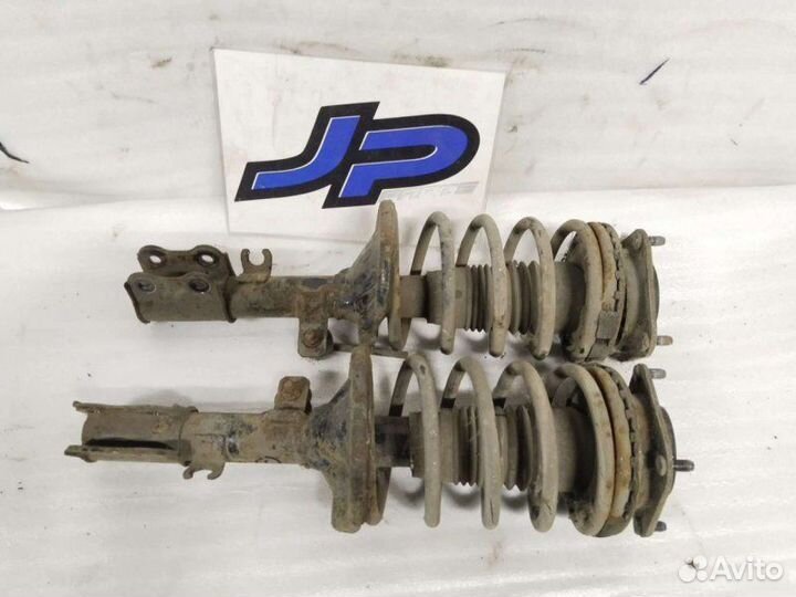 Стойки передние Kia Spectra