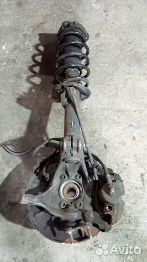 Поворотный кулак с амортизатором Volkswagen Passat