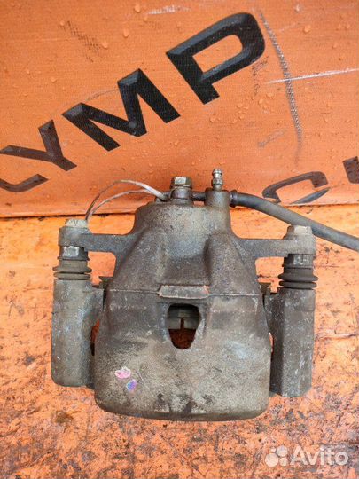 Суппорт передний левый Toyota Belta KSP92 1KR-FE