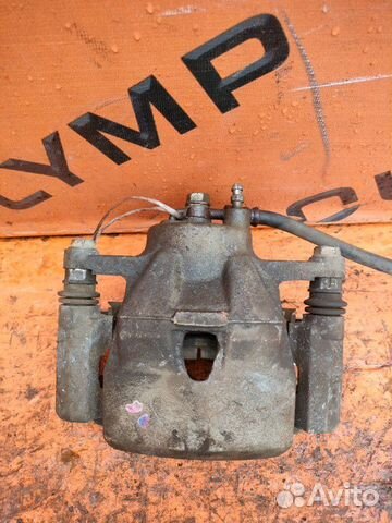 Суппорт передний левый Toyota Belta KSP92 1KR-FE