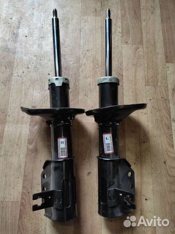 Стойка амортизатора передняя Mazda 323 BA