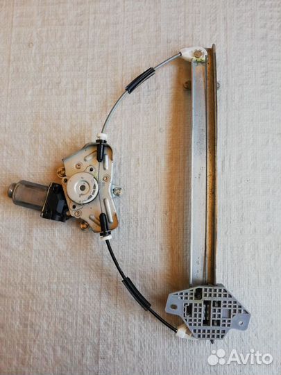 Kia Rio 3 стеклоподъемник передний правый