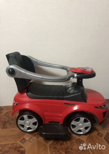 Машинка каталка с ручкой