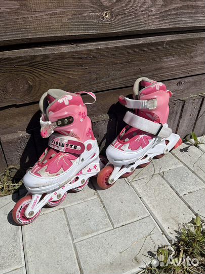 Роликовые коньки