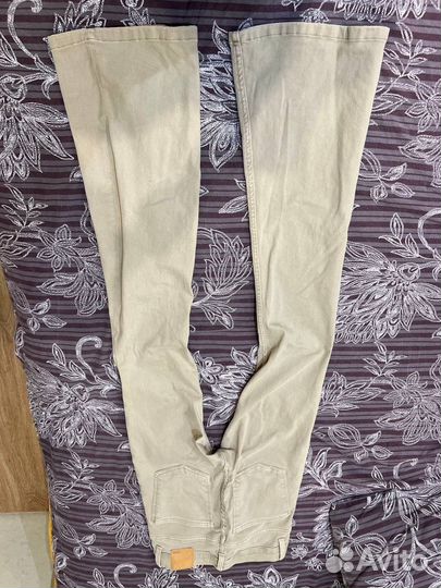 Джинсы клёш женские