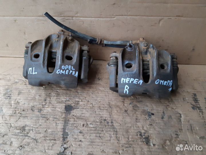 Суппорт передний Опель Омега А