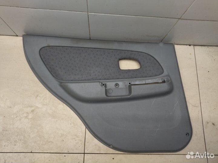 Обшивка двери задняя левая Kia Rio седан A5D