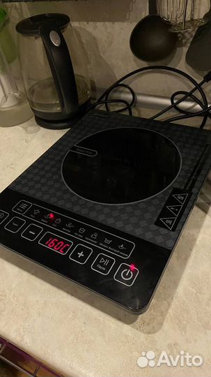 Индукционная плита midea