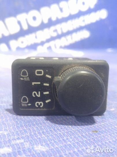 Кнопка корректора фар Nissan Primera P11 седан