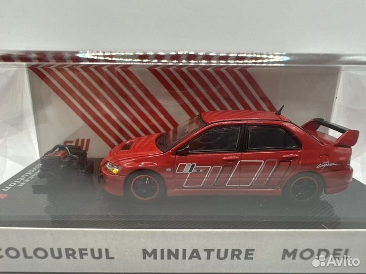 Машинка Lancer evolution 9 1:64