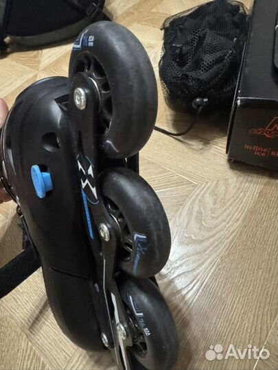 Роликовые коньки