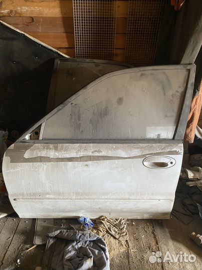 Двери митсубиси лансер