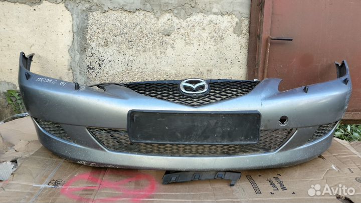Передний бампер Mazda 6 (02-05) дорест