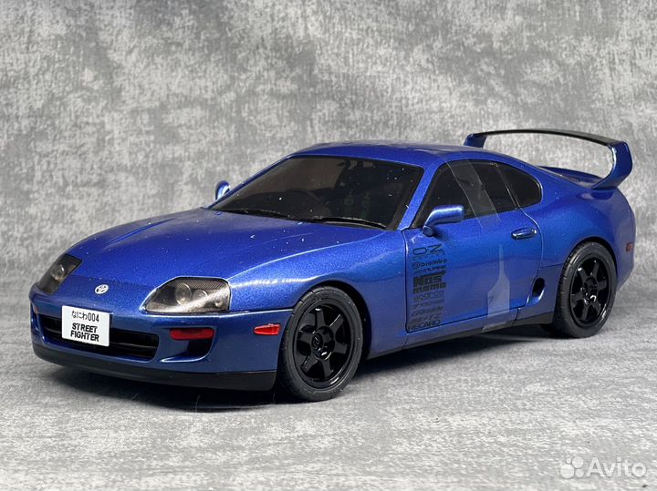 Модель toyota supra 80 1/18 solido