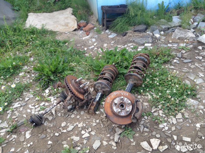 Стойка,суппорт,кулак для тойота Карина e