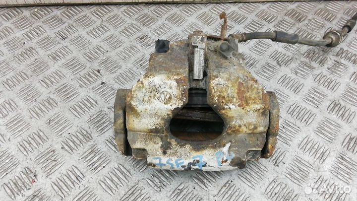 Суппорт тормозной передний левый Фольксваген Т5