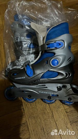 Роликовые коньки