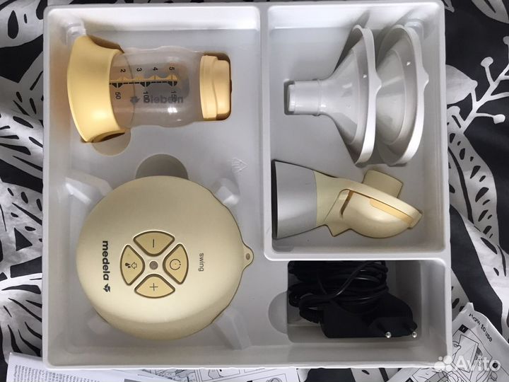 Молокоотсос medela+пакеты для молока