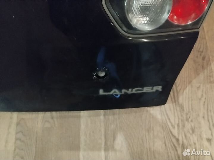Крышка багажника mitsubishi lancer