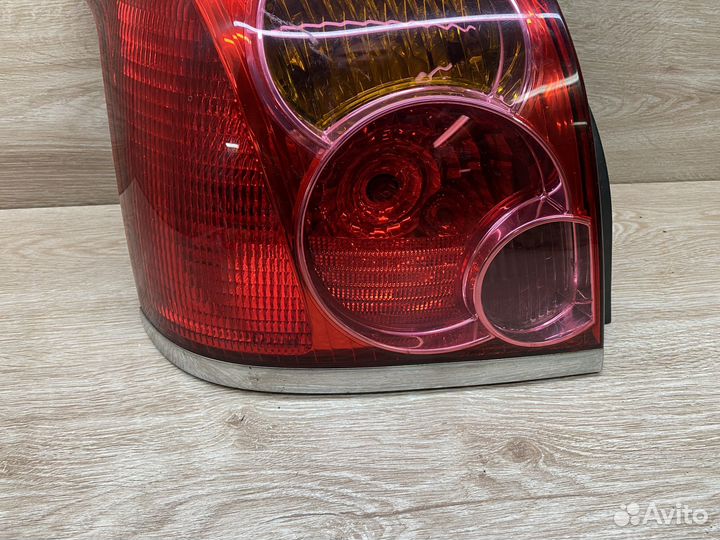 Фонарь левый Toyota Avensis 2 лифтбек дорес 111684
