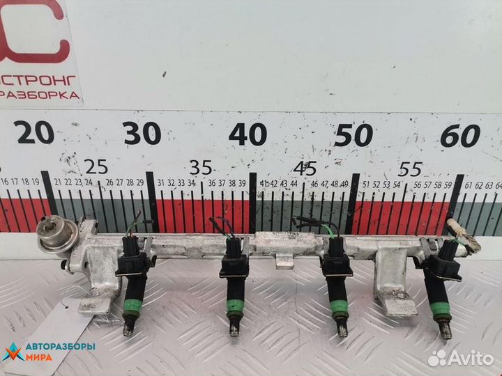 Форсунка Ford Focus 2000 1429840