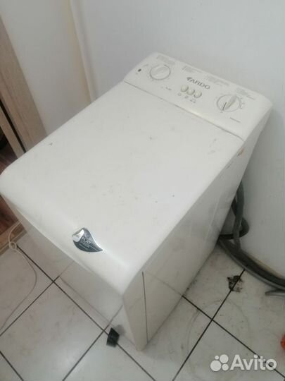 Стиральная машина с вертикальной загрузкой