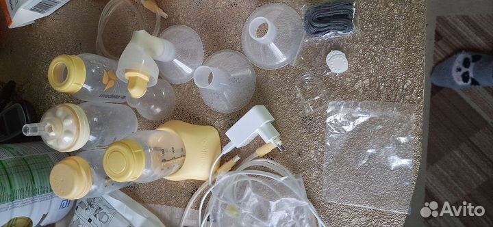 Молокоотсос medela swing